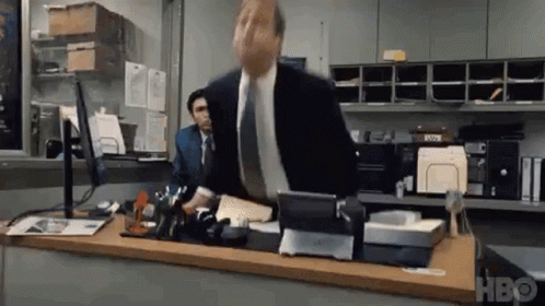 Flipping the desk to get rid of the paperwork